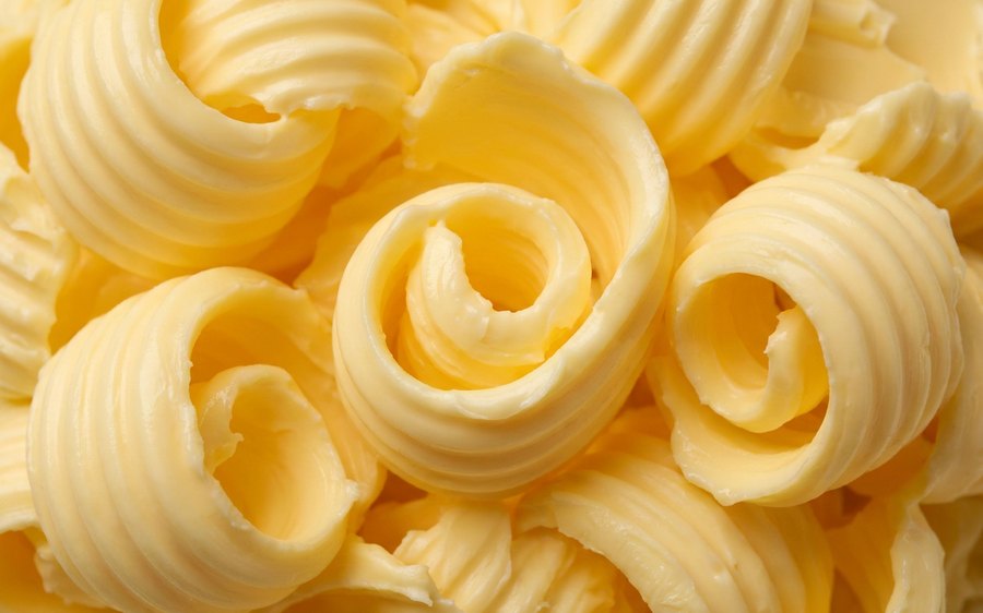 Golden butter curls filling the frame