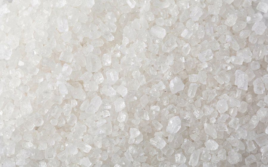 Salt and sugar crystals representing Sensalt and Sensugar, filling the frame